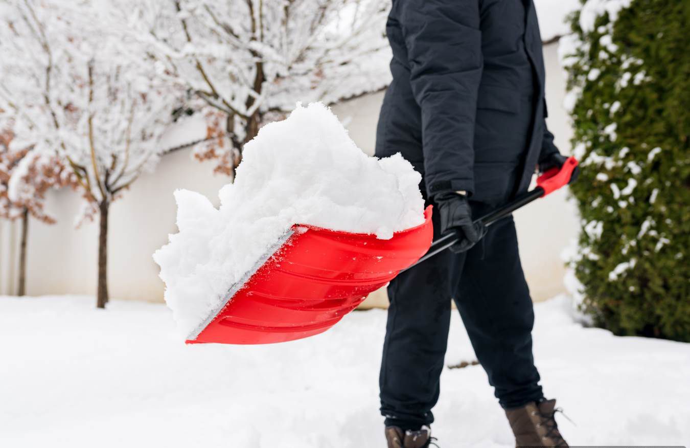 close-up-of-man-clearing-snow-and-ice-from-the-sid-2024-12-05-01-37-57-utc-Optimized